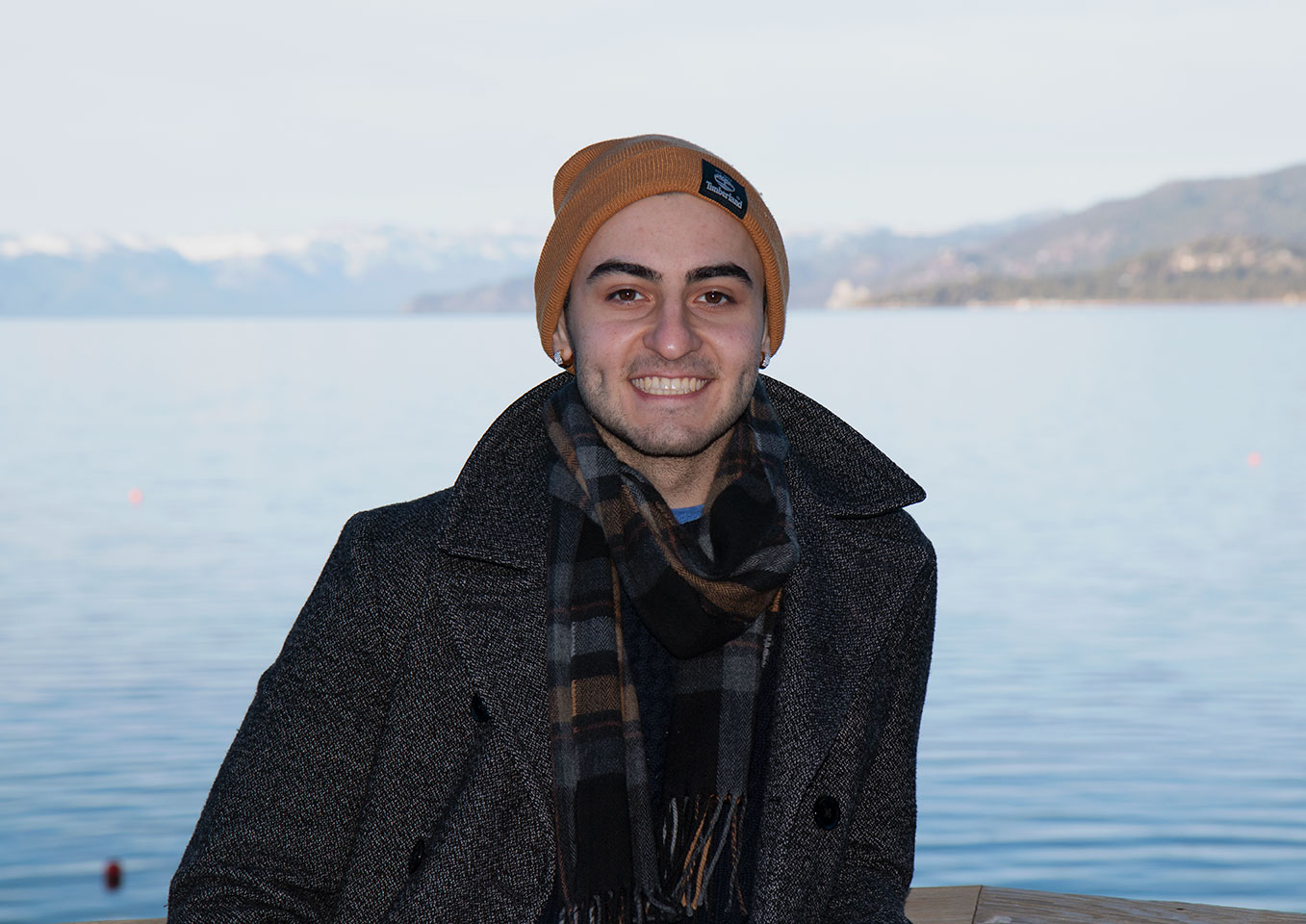 Moisey Alaev by a mountain lake